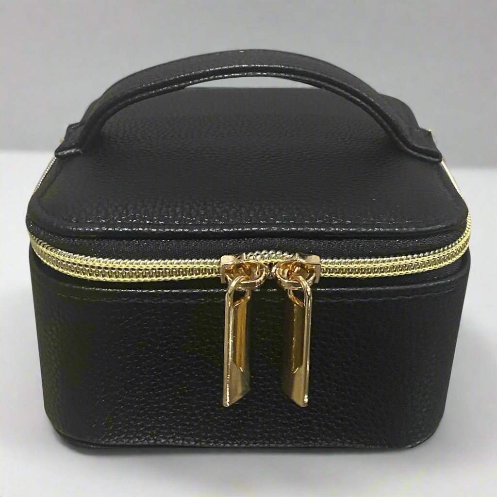 Stay organized in style with this compact travel jewelry case