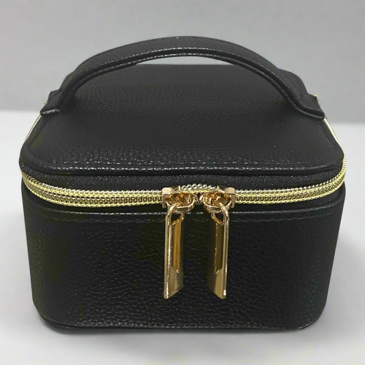 Stay organized in style with this compact travel jewelry case